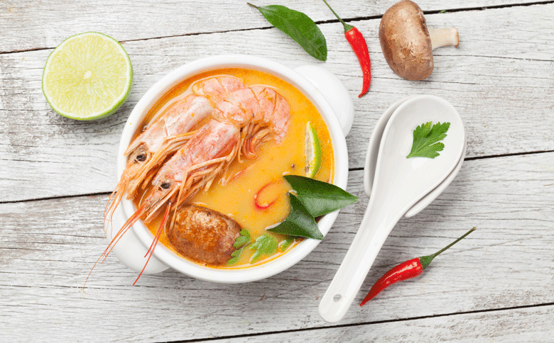 Tom yum goong. A spicy soup in Thai cooking with Chillies 